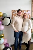 This dress was perfect for my winter baby shower. I'm 34 weeks pregnant with a good sized bump & my regular size fit perfect! Has a really good amount of stretch - Ashly A.