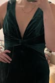 Dress is gorgeous, received many compliments, especially on the back. However, was too big, specifically the bust area. I was able to tape the dress down. Ordered a medium first, which was huge, and then reordered a small. Small still ran big, but was wearable. Overall would order again, it's a beautiful dress! - Bailey H.