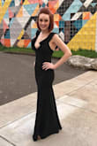 This dress was amazing!! The fabric was thick and soft so it hugged my curves in all the right way. I can always count on Lulus for a perfect fit with their dresses. I received this dress the day before my event and it fit perfect. Simple black dress but so elegant. I had a stranger come up to me and say I won the award for best dressed! I need this dress in every color!!! - Michelle E.