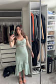 Excited to wear this to a beach wedding! Fits well but not too snug. Fabric looks well made and love the mermaid shape of the dress. - Elyse K.