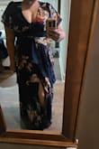I am beyond happy with this purchase! I'm going to wear this dress in March.  It's a heavy dress, many layers with no stretch (except for the top back), perfect for the chilly time of year.  I will be pairing it with cowboy boots (which I don't have yet) as the wedding will be on a farm, so needless to say, the front slit is a bonus to show off my boots! This dress is not only forgiving for a full-figured person, but it has flowy arms to hide my arm fat, lol. It literally accentuates the breasts for a lil sexiness without being over the top. It is a sweet, yet subtle, sexy dress. The back top part of the dress is a popcorn stretchy material so that makes it so much more comfortable and less bulky looking in the back, which smooths the cleavage, and your breasts do not look squished! Lol. I had a regular bra on, no need for a slip, as the material is thick. I have olive skin, and the colors of this dress look amazing for my skin tone! - Lisa S.