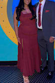 This dress is absolutely stunning! Love the burgundy and the ruffles. However, the bust/shoulder was very loose, but the waist was snug. It was a little bit of odd fit, but I pulled it off with some safety pins on the top. - Ashlyn G.