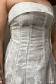 Ordered this for my bridal shower and ordered my true size medium based on the bra measurements (I'm 34B), and it fit like a glove! I was skeptical about the rhinestones being black, based on the picture, but they're not! They're shimmery/silver and so beautiful! - VICTORIA P.