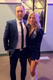 The sparkly romper is beautiful in person and actually comfortable. I bought both a small and medium, but have a small chest so the small fit a little better. It takes on a purple color too. I camped it up with some fun white sparkly cowboy boots and got called a Dallas Cowboy Cheerleader all night. - Misty R.