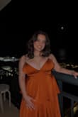 I'm five foot, so even with four inch heels it was so long on me and I was having to hold it up all night. Also I have huge boobs so they were kind of spilling out but oh well, YOLO. Anyways, it fit me perfectly and I loved it and got so many compliments. Wore it to a Mardi Gras ball. Also so so flattering. - Elisa K.