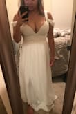 This dress is gorgeous but my girls were busting out of them. I ordered the large and the fit was perfect, except the length. Being 5'2", I always have that issue anyway. There is no stretch to the dress, but it's comfortable. If my boobs were smaller, I would've totally kept it. - Nhu E.