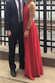 I felt like a movie star in this dress! I tried both red and navy, and although I typically would have gone with navy, I just loved how striking and elegant the red is. I have a pear shape so I tend to gravitate toward anything that hugs the waste and fits loose in the hips. This dress has a sheer outer layer and it flowed beautifully in the wind. And the adjustable straps made it fit like a glove. 
With all of that said, be aware that this dress runs a little long. I'm 5'7" and wearing heels and would pick the dress up in the front when I walked. I didn't mind this at all since usually dresses are too short for me, but if you're on the shorter side you may need to have it altered. Not a deal breaker in my opinion. - Mara F.