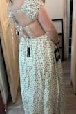 Dress was super cute, and material was comfortable. Had good stretch to it as someone who has a bigger upper body from weight lifting. Simply returning because it felt too casual for a work event. - Destiny H.