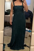 I like this, but in my opinion, it would not meet formal/black tie if that's what you're looking for. Looks more casual and sundress type. However, it's a great color and looks good on. I don't, however, like the fact that the bow is only on one shoulder. I thought that was odd. Also, the zipper on mine didn't work, so I had to return it, so there may be some QC issues, but don't let that dissuade you if you want to try it - Maya S.
