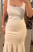 Very impressed with the quality of this dress but not "hip" friendly. At least not mine. So cute tho! And good thickness. Has a lining. - Megan O.