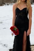 The dress was beautiful! My daughter got so many compliments on it. The material was a bit thin, but you couldn't tell. See through bodice area was a pretty touch. - Nicole R.