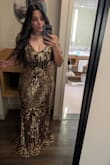 This is a beautiful dress. I'm so glad I took a chance on it! I ordered it for a gala, and it fit perfectly. I received many compliments. I bought the earrings that Lulus suggested with it, and they were perfect. The fit is very stretchy! I have a very large bust (UK 32GG/US 32J) and large hips. I generally fit medium in other clothes, sometimes large. I went with the large for this dress and am happy I did because it fit my bust well with a strapless bra (and the straps tightened as far as they could be). Very pleased with this dress! - Renee D.