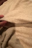 Buyer beware. This is a terrible purchase and pills after 1 wear. The photos don't show very well. But I wore this sweater for 3 hours and it looks like it's aged 10 years and needs to go in a donation bin. The quality is terrible. - Sandra F.