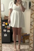 I loved the material, but it fit a little weird. There was a small tear on the left chest, but that's not the reason I returned vs exchanging. It was a little tight in the chest area. I tried it on with and without a bra, and honestly like the fit in the chest more with a bra, but that made the back very tight. The overlapping on the chest area definitely doesn't cooperate correctly with a larger chest. Everything I've ordered from Lulu's before has been medium, even when I weighed more, and this honestly fit the least. I really liked the idea of the dress, and it seemed to work well for others, but sadly not me. Will definitely still be ordering other dresses from here, though, as this is the first experience I have of a dress not working out from here! - Campbell P.