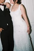 I was between sizes XS and S, but both fit decently, and it was down to a matter of preference. I altered down the S for a better fit. Otherwise, don't think any further and GET THIS. It's a vision come to life with value. stunning quality, beads held up, and made me feel amazing on my wedding day. - Clara L.