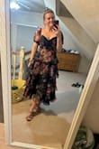 This dress fits perfectly! It's comfortable and looks elegant. I am a little bigger chested, and I don't feel like I'm spilling out of this either, which is great. Thanks! - Amy S.