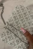 I love this clutch to go with my engagement dress. It holds my phone and a lipstick, but the look is gorgeous. Hope it doesn't wear off quickly. Love the floral and diamanté detail. - Sabnam S.