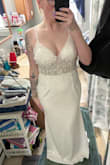 I am obsessed with this dress! It is perfect for my wedding in September. I ordered a few others, but this one takes the cake! The fit is perfect (will get minimal alterations). I love the details on the straps and bodice. Quality material. - Gala H.
