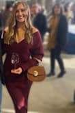 I wore this to a big wine event and it was a hit! Very comfortable and flattering. It def kept me warm - so in a room full of people I was hot. But when I was outside at the event, it was perfect! Gorgeous color - Sarah S.