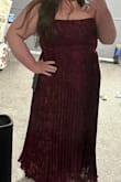 Beautiful dress! There is no give, and measurements are true to size! I thought I could get away wearing this because my measurements are only an inch or two more, and it did zip, it was just very tight and very true to size! I got XXL. - Sophia S.