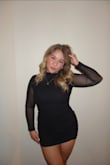 This dress was gorgeous, and it fit true to size! I wore it for my semi formal, and it definitely gives off New York City vibes, especially when you pair it with black boots! - Audrey D.