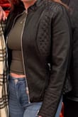 The material is perfect for a fashionable leather jacket. Super cute! The zippers are great quality. I got a lot of compliments! - Maddie H.