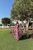 I'm 5'11 and wore this with 2 inch heels, and the length was absolutely perfect. It's so hard to find a true maxi for tall girls, but this one actually hits where it should. I wore it to a wedding and received so many compliments all night. The floral print is stunning in person, and the fabric flows beautifully when you walk. Elegant, flattering, and comfortable!!! - Sheena L.