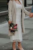 I shortened this dress to tea length to wear for our casual wedding, and it turned out perfect. The dress feels high quality, but it did stretch a bit as the day went on due to the heavy beading. This made the straps a little loose but nothing too terrible. The beading photographed great. - Torrie R.