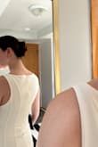 I received this dress with a hole below the zipper. When received a replacement, the second dress had a hole in the same spot. Shame, it was an elegant look! - Teeghan M.