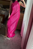 Love love love this dress! She does run a little big, so I would size down. - Jordan S.