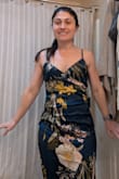 The material is light and lays beautifully. I was nervous the fabric would be too thin, but it still felt like a quality dress. I was also nervous the top would be too loose, but that felt great, too. I'm so excited to wear this for a wedding in Jamaica and am hoping to find a few other excuses to wear it after that. - Erin B.