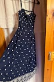 Dress is stunning, fits true to size. There is a little bunching at the top of the dress from where the back is open. I would say, for the price, the material is a bit thin compared to other Lulus dresses I've bought, and some of the embroidery has little strings. Otherwise, a very pretty dress! - Alexis L.
