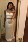 this dress is beautiful! the straps on the top and a little loose but other than that everything fits perfectly! i love it so much and it's my prom dress - Duifa L.