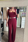 This burgundy jumpsuit is fabulous! I have it in black, and when I saw this color, I had to buy it.  It's super comfortable.   I travel for work, so it will fold up just fine - no wrinkles.   It is long for all the tall babes, so I have to wear heels with it.  It's still a teeny bit long but manageable. - Carrie P.