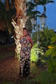 The dress is gorgeous. I read reviews about getting it tailored, but I thought as a chestier person, I would be fine. It was still a little loose in the chest, but everywhere else fit perfectly. I will get it tailored to wear again. - SHANEEQUA V.