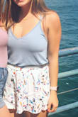 love this shirt!!! it's perfect to just throw on with jeans for a slightly more fun casual look, but also tucks in well with so many shorts! would definitely get in more colors - Hayley B.