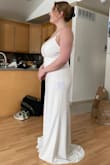 This dress fits true to size and hugs all the right places. Very happy with it! I wear a 34H, and this holds my chest very well. I have honeylove shape wear on underneath. I am typically a size 10, but sometimes a 12 in dresses because of my chest size. I bought the Large. I might get the straps fortified when I hem the dress. - Tacy C.