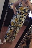 I love this jumpsuit! I know the length is supposed to come up a little shorter, but personally I like the fact that it fits at a perfect length for pants on my 4'11" frame. Plan on wearing to a spring wedding with white wedges. Everywhere else fits perfect, and can obviously be worn with a strapless bra. The pattern might be a bit much for some people, but personally I like it. - Alexandra A.