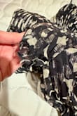 Seam under the right bust area came half ripped up. Looks like someone returned it, and I got this faulty item. If selling for final sale,  please double check on your quality control.  Didn't even get to try it on. - Ellen C.