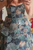 The dress is very pretty, great material as well. Is it just like the picture. The bow on the shoulder straps makes the dress even cuter. I ordered the size according to what I thought, but it was a bit tight; material does not stretch, but it also makes u look slim! "GIVEAWAY 2026" - Guadalupe N.