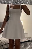 I love this dress so much. I bought it for my graduation (Class of 2026) and it is just the perfect dress. The material is amazing and truly so soft. I will have to get it altered around my chest due to not having enough to fill the top part, but other than that the dress is beautiful. - Melissa O.