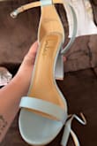 The baby blue color is beautiful and matching perfectly for my daughter's dresses for my wedding. They're not very comfortable at all but what heel really is lol. They fit true to size. The ankle strap barely fit my ankle though, like thank goodness it's stretchy? - Kaytee D.