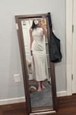It is exactly what I was expecting. Complements a tall figure very well. I will say if you're bigger-chested, this isn't for you. I am only a B cup, and it's a bit tight around the chest. Slit does go up several high. Is slightly see-through, but wearing nude under it work perfect! - Mary E.