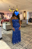 Overall, a beautiful dress that's comfortable and flattering! Comes with built-in cups, so not best for bigger chests. I'm a 38D for reference. The slit is long, and I got mine tailored so it was a bit less revealing. It was a cheap fix! Everything else was great! - Adiel P.