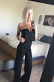 I'm usually a small- but some reviews I read said if you have a longer torso order a size up to avoid it riding up in the wrong places. So I ordered a medium and it's about a perfect fit! I wish it was just a tad longer although its a perfect length right now and won't drag on the ground. You don't need to wear a bra but I might find one that give mine more of a lift. Great purchase! - Rachelle G.