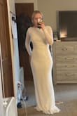 When purchasing, I checked out many reviews before deciding. The dress is nice and snug. I will be wearing some undergarments for my stomach. In these pictures, I don't have any on. I also don't have a bra on in the photos either. The sleeve is comfortable, but you can still feel the beading. It's not enough personally for me to be uncomfortable with the beads. The top fits nice, and the back has a nice swoop down on the lower back. The inside of the dress is nice and soft. I would recommend to other brides or anyone looking for a white dress.  My sizing: 32D, size 28 pants, size small in shirts. I weigh about 140. I am 5'4 - Liv H.