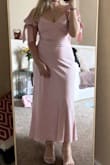 This dress is so cute, the color is beautiful, and the fit is nice. The only reason it did not work for me is my lack of breast I own. I wish there was more support in that area to hoist up the front a bit. However, I love this dress. The amazing thing is you can wear nipple pads, and it does not show through the dress. Overall, the fabric is thicker. - Dzevada C.