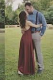 This dress is absolutely beautiful! I ordered it and wore it in my best friends wedding. We all had different dresses and mine defiantly stood out. The material is thick and is such good material, but it felt light and flowy. The only thing I had an issue was, was finding a good backless bra to wear with it. Having a bigger chest doesn't help in the backless bra department, but I was able to find something that worked and it worked well for that day. I ordered the 'wine red' color, and have worn to other events. It is defiantly one of my favorite dresses. Highly recommend this dress, it is timeless! - Angela F.