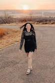 Based on the reviews I ordered a small. I was too busty for it so I exchanged it for the medium. The medium fit perfect! I did, however, have to have it hemmed. It came right at my knees so it was an awkward length. - Kassi A.