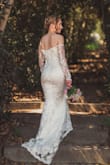 I wore this for my courthouse wedding ceremony and photos afterward at a botanical garden. This dress was so beautiful on a budget! I normally hate off-the-shoulder dresses, but when I saw this one, something about it felt right. The lace and embroidered flowers were so pretty and photographed very well. I could've gotten away with wearing it unaltered, but chose to so that it fit every curve completely perfect. I'm 5', very small chested, and have full thighs and booty. I wore 4" heels and still needed hemming. I had the bust made smaller, and the sides let out a smidge. I think I tried on over 20 Lulus dresses, and this one just felt higher quality with the dress materials and shape! I loved wearing it, felt so pretty, and received so many compliments! - Amanda M.